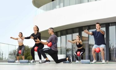 Group fitness training session at Portugal wellness retreat.