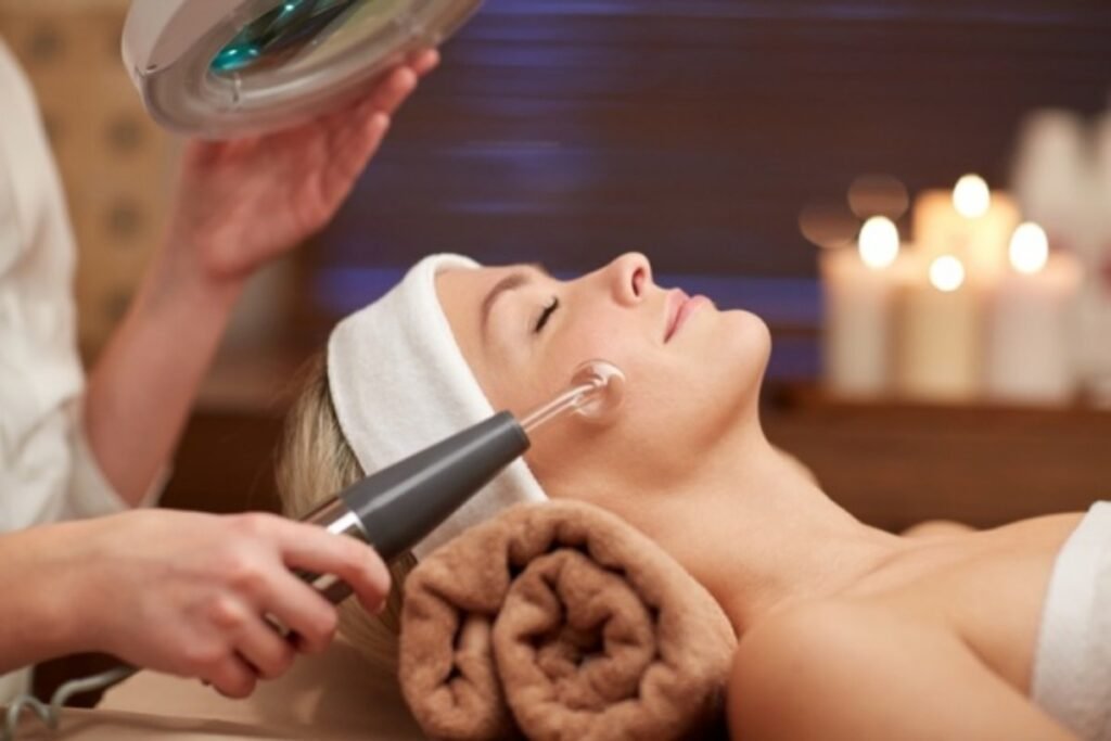 Professional esthetician giving facial spa treatment at wellness retreats portugal