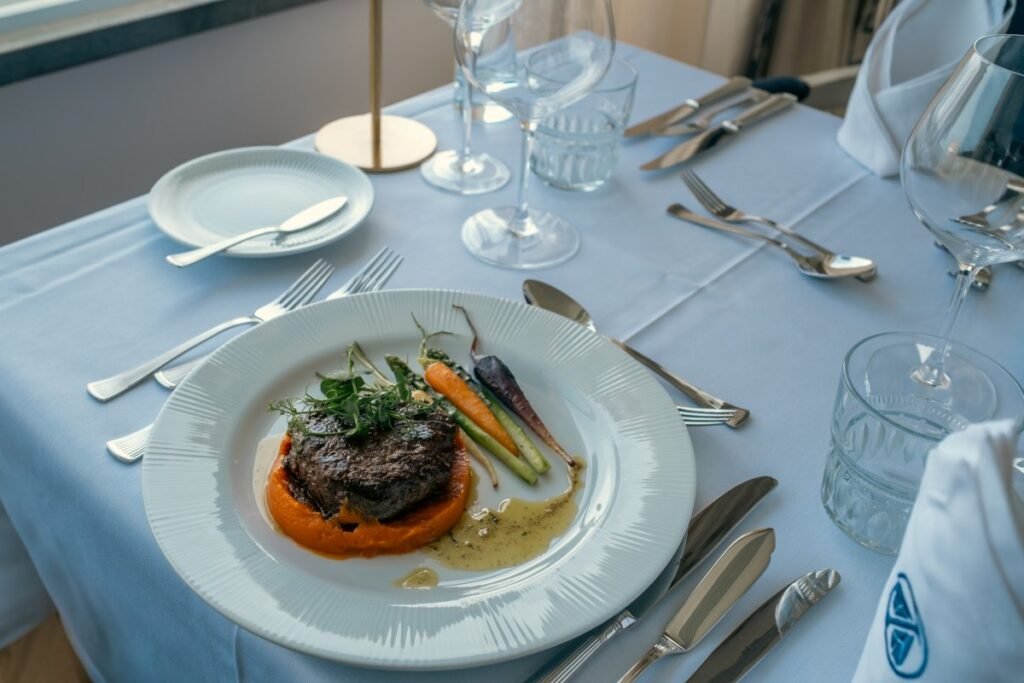 Gourmet fine dining plate served at Portugal wellness retreat.